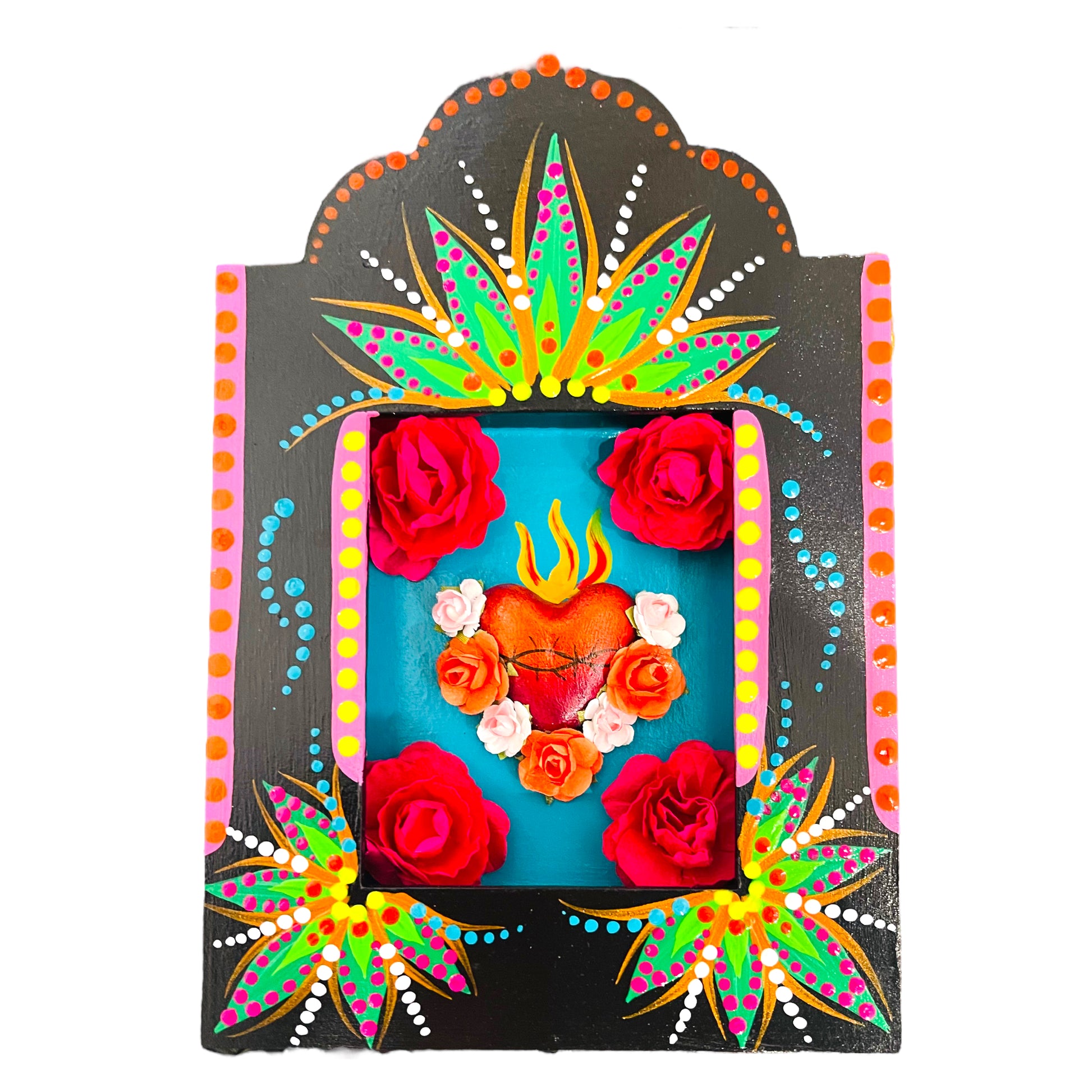 Cultural niche for home decoration painted in black is handmade with the famous Mexican red heart, red paper flowers in the center of the niche. All around is black and painted with green leaves.