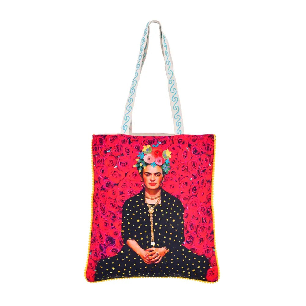 The multicultural red tote bag is decorated with roses and in the centre of the bag is an illustration of Frida Kahlo with a black dress and yellow dots.
