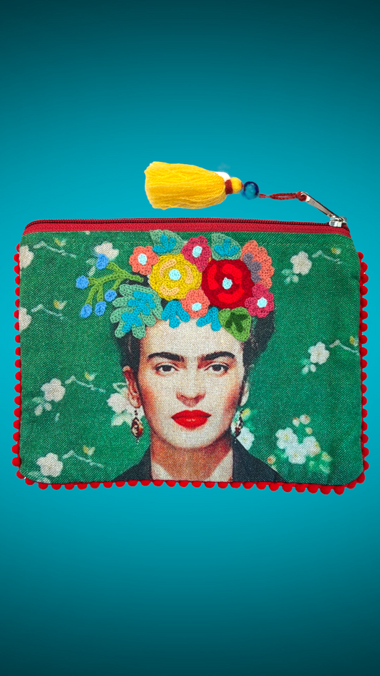Green purse designs embroidered with the image of Mexican artist Frida Kahlo in the center.