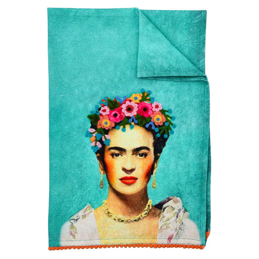 Embroidered teal towel with Frida Kahlo image in the centre. The illustration has a crown of flowers in different colors on her head