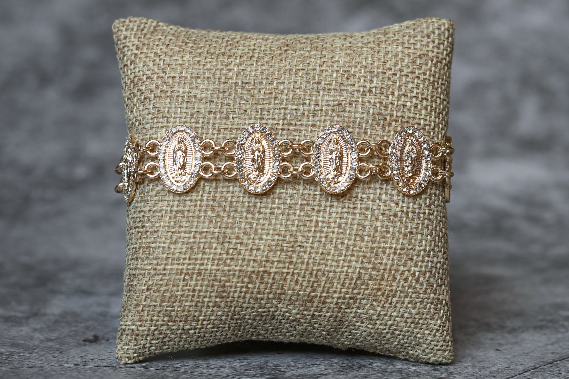 Multicultural oval-shaped gold-plated bracelets of the Virgin of Guadalupe
