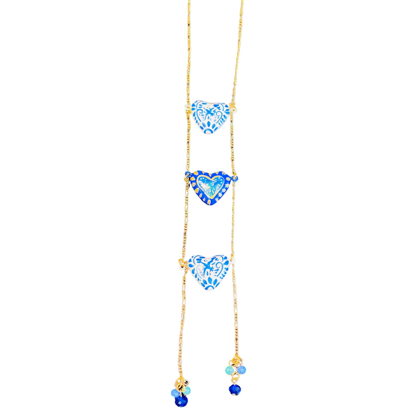 Triple blue and white heart necklace hand painted with different designs.