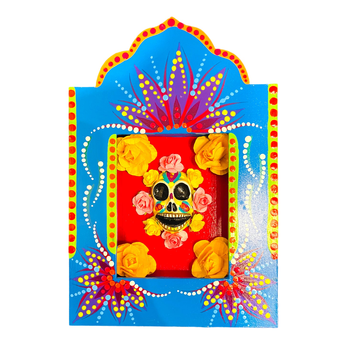 Blue hand painted cultural niche for home decor is handmade with a catrina in the center, and yellow paper roses with red background. Around are three purple flowers with blue and yellow dots of different sizes. 