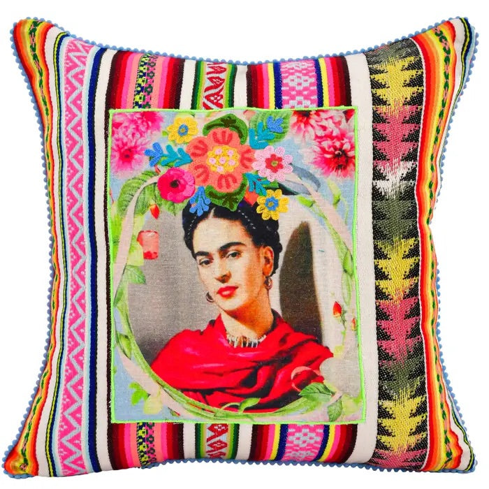 Multi-colored pillow with hand-embroidered photograph of Mexican artist Frida Kahlo dressed in your red blanket and crown of flowers on her head.