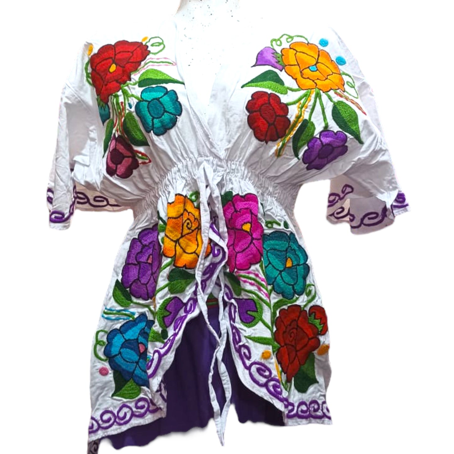 World fashion long-tailed white blouse with embroidered pink, orange and purple flowers of different sizes. 