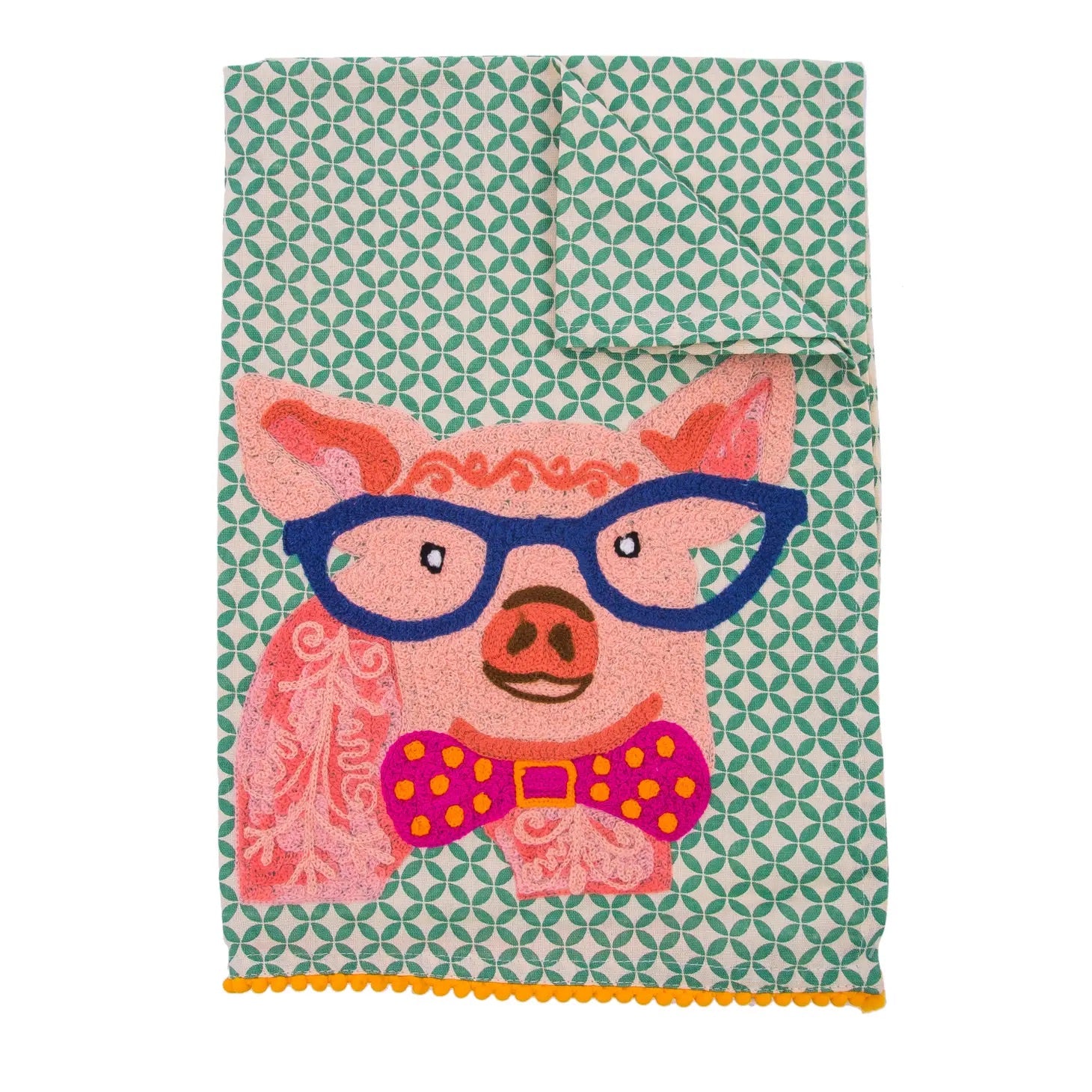 Embroidered towel with a little pig with blue glasses and pink tie in the center. It is handmade with green and white texture and orange border. 